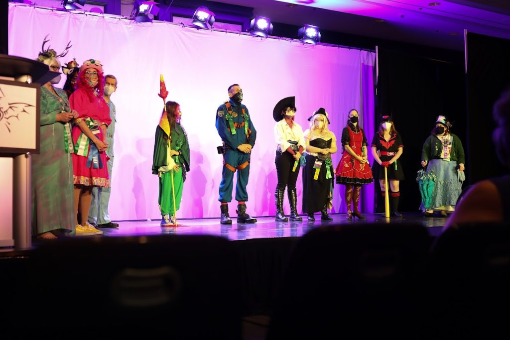 People in costumes on a stage